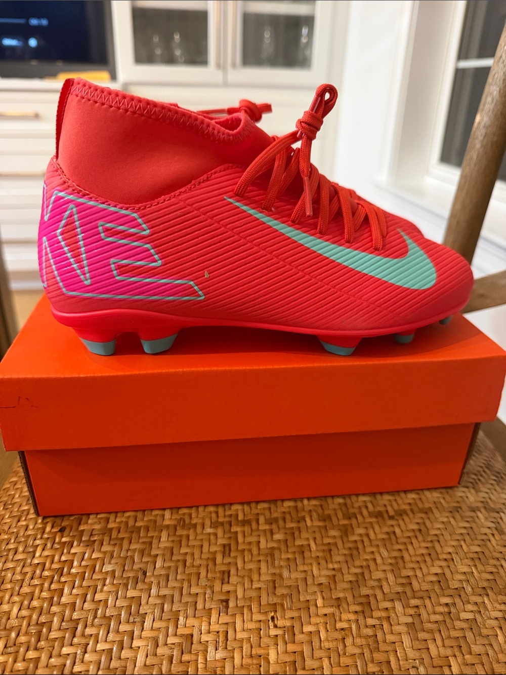 Nike Bright Red Soccer Cleats with Turquoise Swoosh